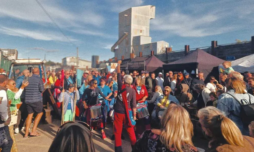 a group of people gathered together at the Whitstable Rocks Oyster Festival