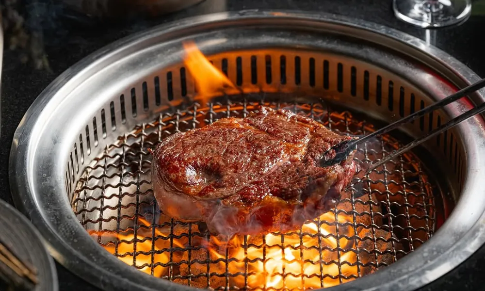 wagyu on a grill at kanpai soho