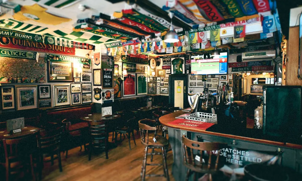 pub with lots of decor and football scarves