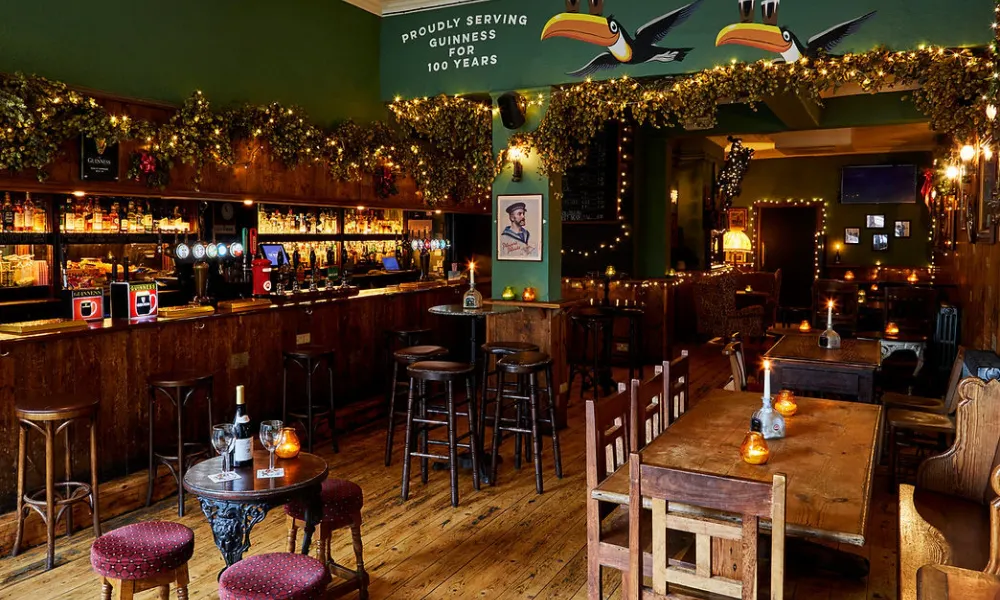 Cosy pub interiors with candlelit tables