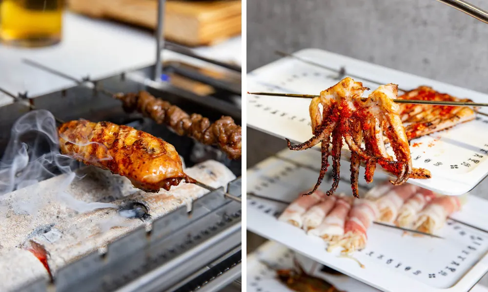 Korean skewers being cooked over an open coal grill