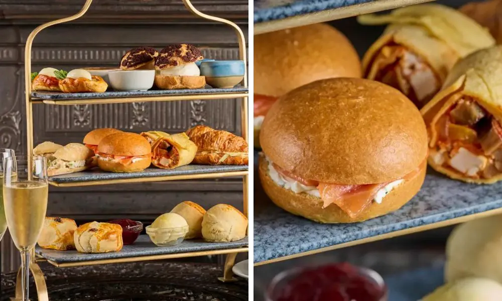 three tiered afternoon tea with champagne and smoked salmon and cream cheese bun