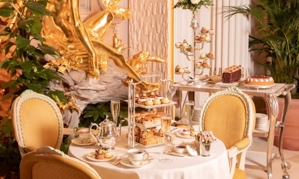 gilded chairs at ritz afternoon tea