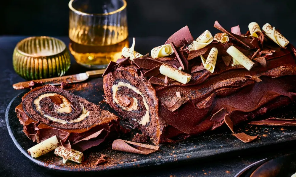 Chocolate yule log with white chocolate curls