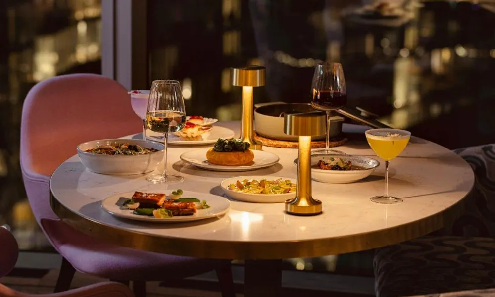 cosy lamps and dishes on table