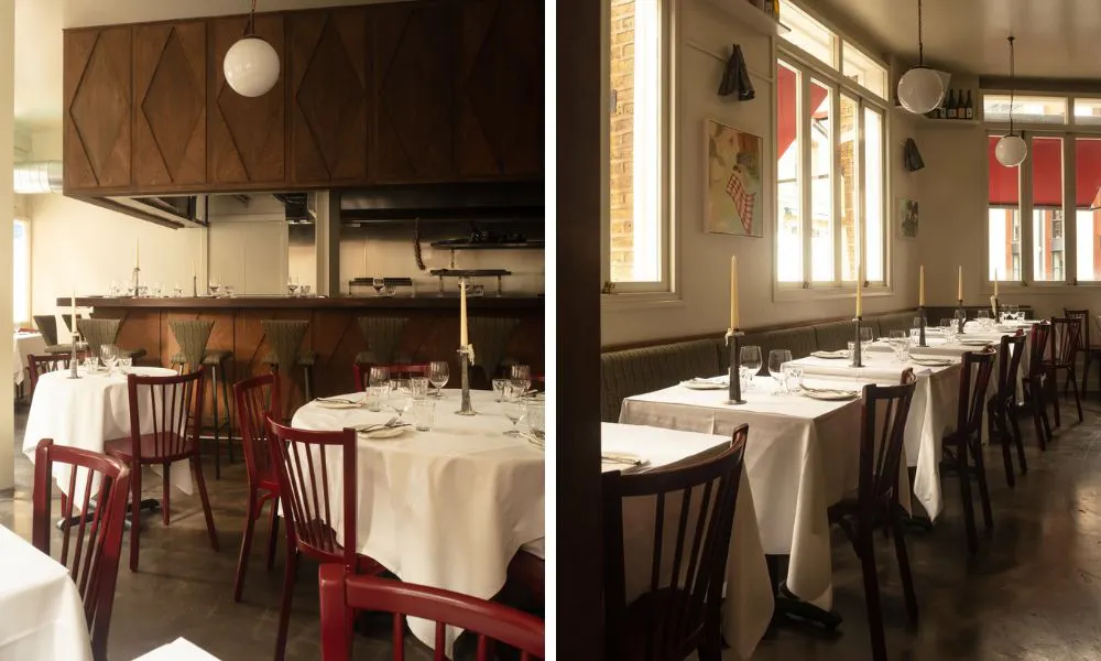 white-clothed and candlelit tables at Bistro Freddie