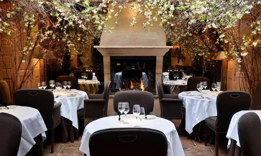 Clos Maggiore romantic dining room with tree
