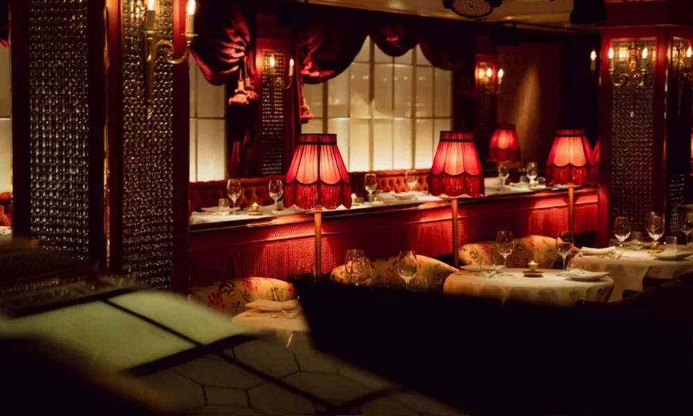 Cabaret lamps in red dining room at park chinois