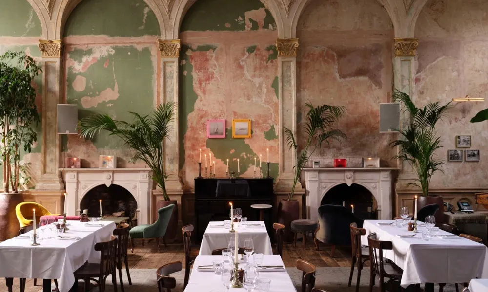Dining room with intentional exposed plaster