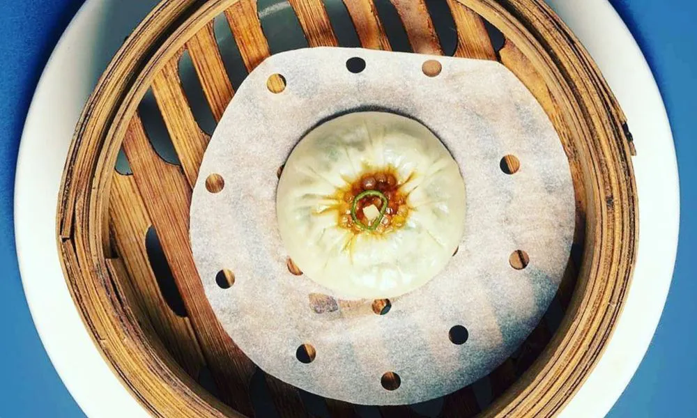 Single bun in bamboo steamer