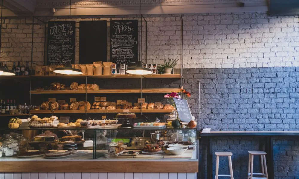 stands of cakes and pastries at Kember and Jones