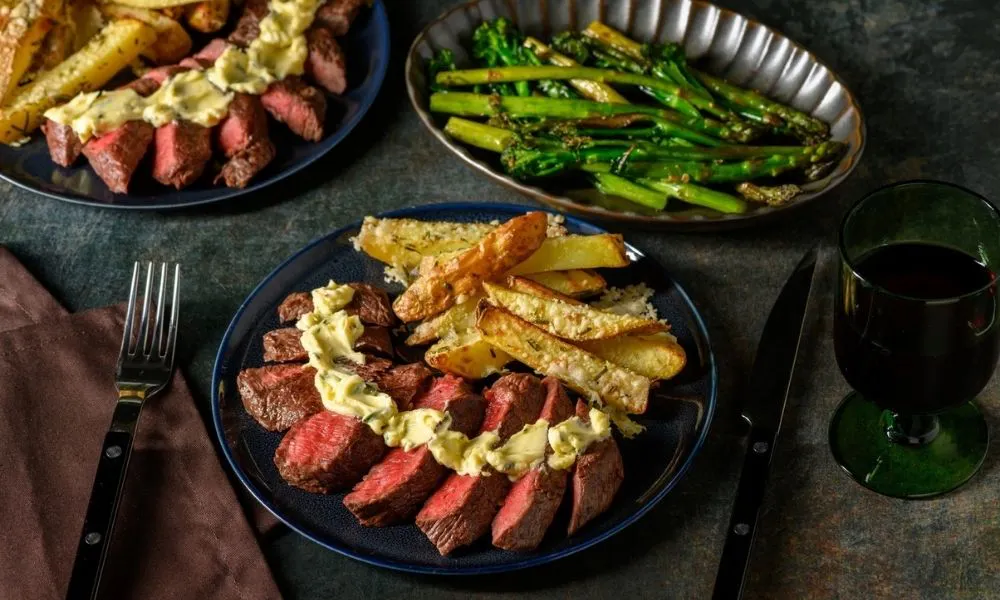 steak with chips and broccoli