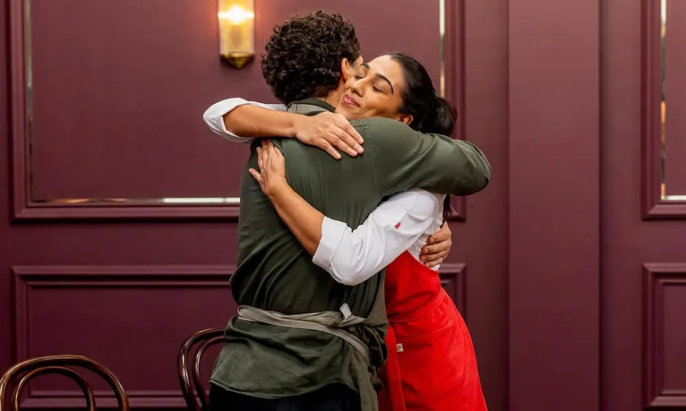 Corrin hugging Nikita after his starter course won