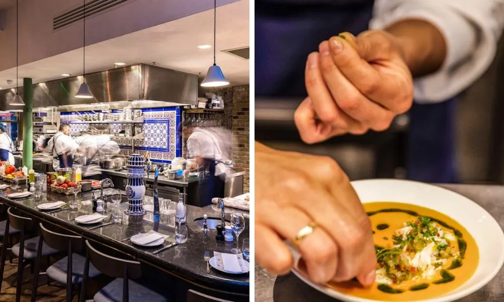 Long dining table and chef garnishing soup