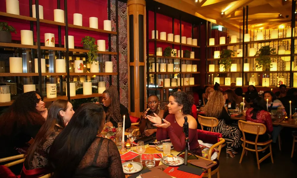 red dining room with larger group tables