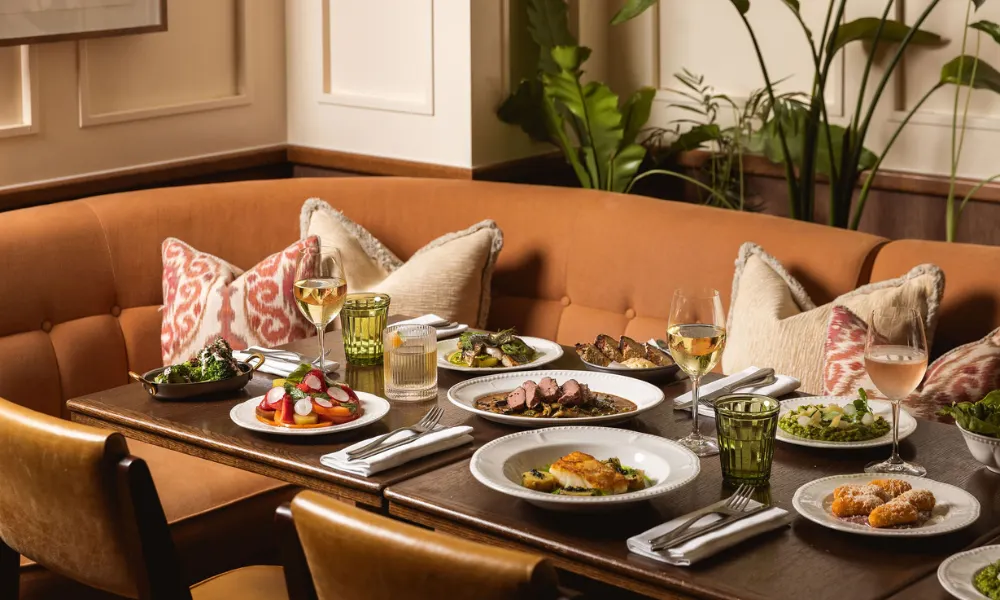 Corner booth table with selection of starters and mains