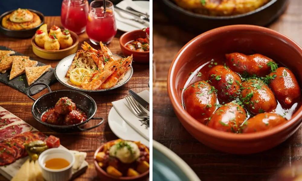 An aerial shot of lots of different tapas dishes on a table
