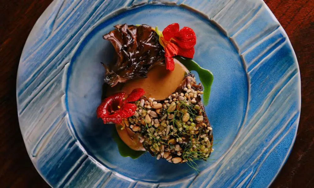 An exciting flavour-packed dish at Anglothai, served on a blue plate