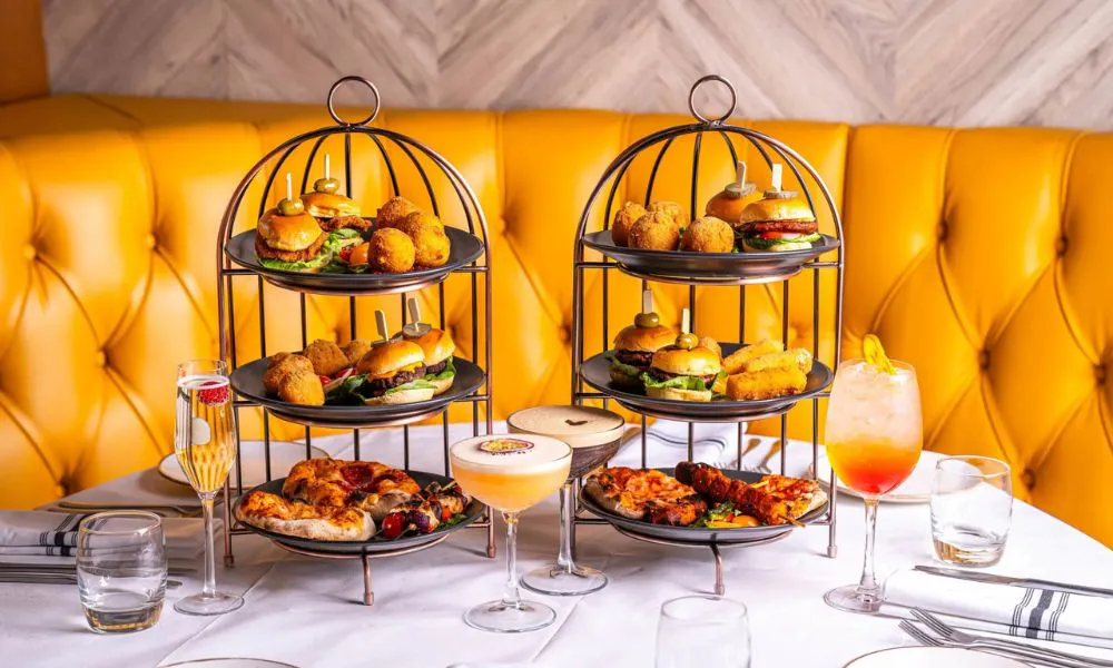 bird cages filled with brunch snacks