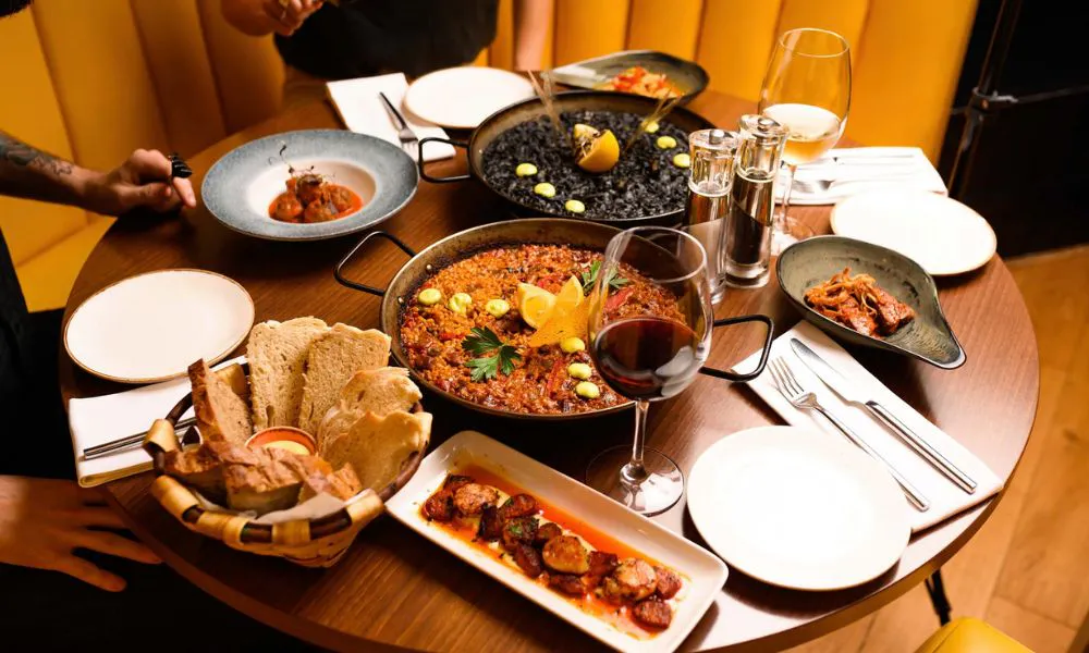 a collection of Spanish food on a table 