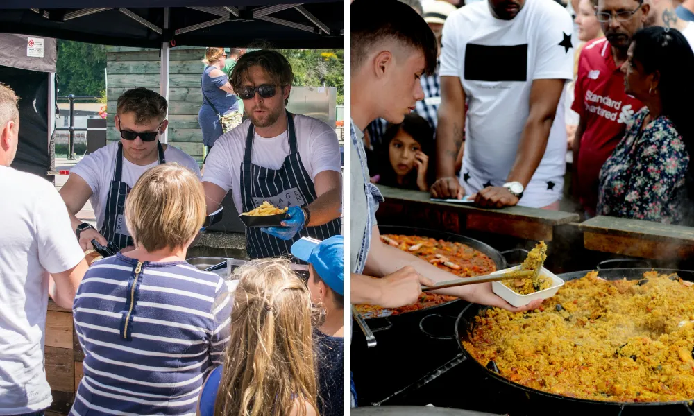 men serving loaded fries and big wok of paella