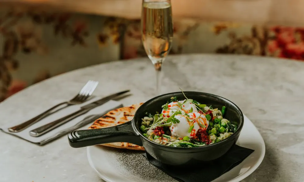 a brunch dish and glass of Prosecco