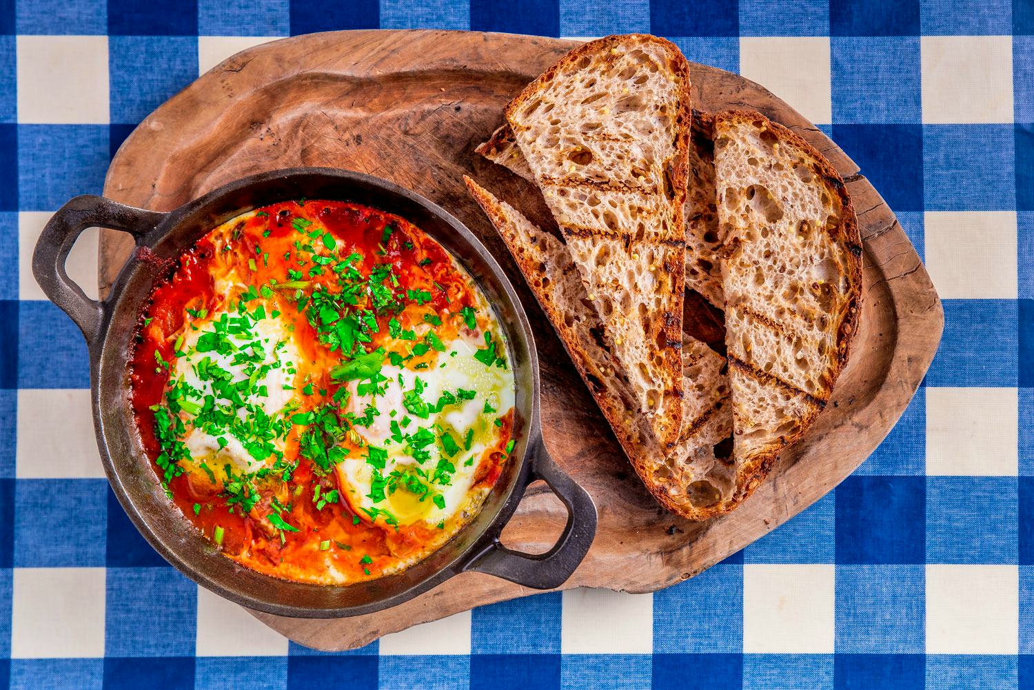 Megan's restaurants baked eggs in tomatoes with bread