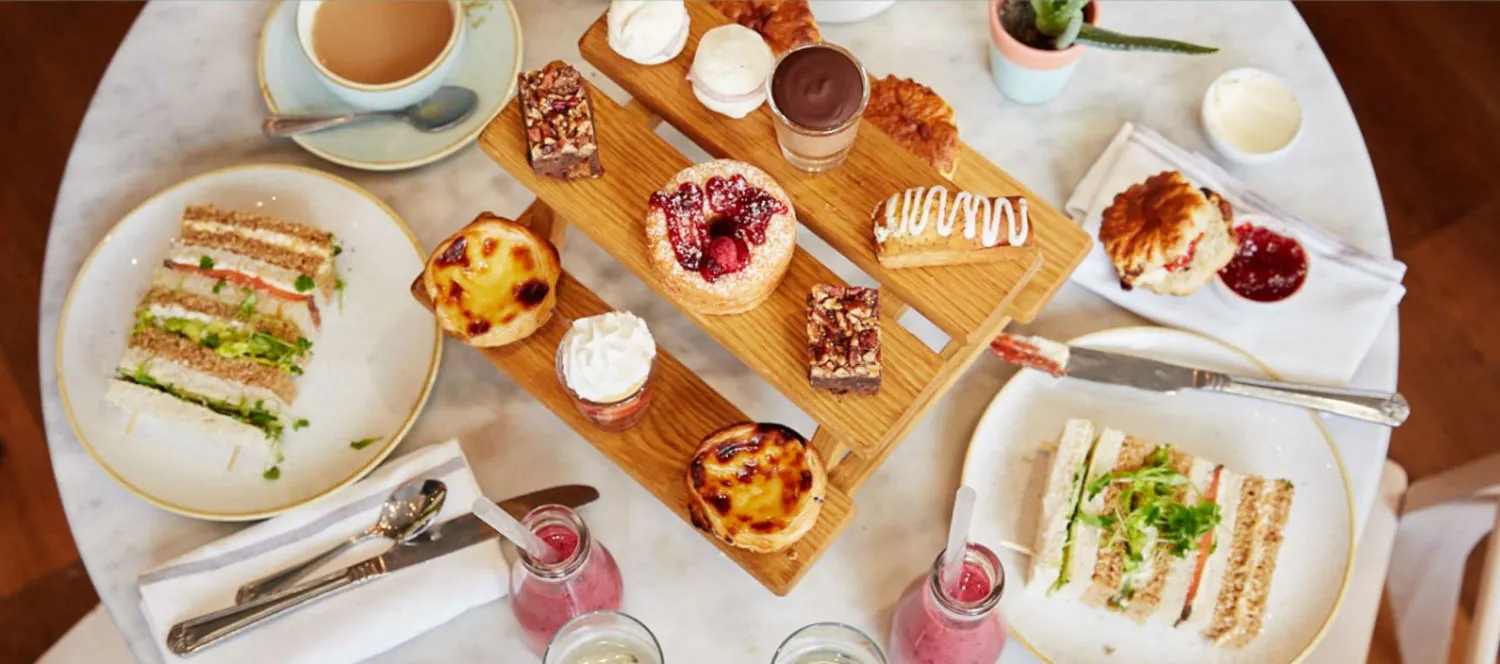 cakes sandwiches on table