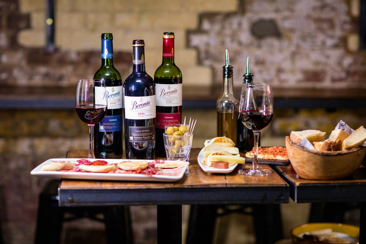 Beronia wines red wines on restaurant table with food