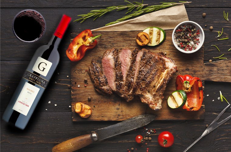 Graffigna wine and meat stock image