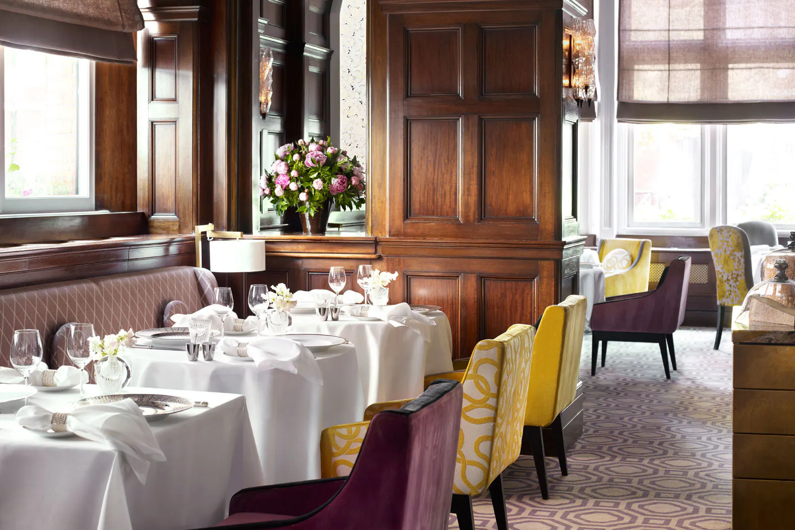 Helene Darroze at The Connaught interior fabric chairs wood pannels 