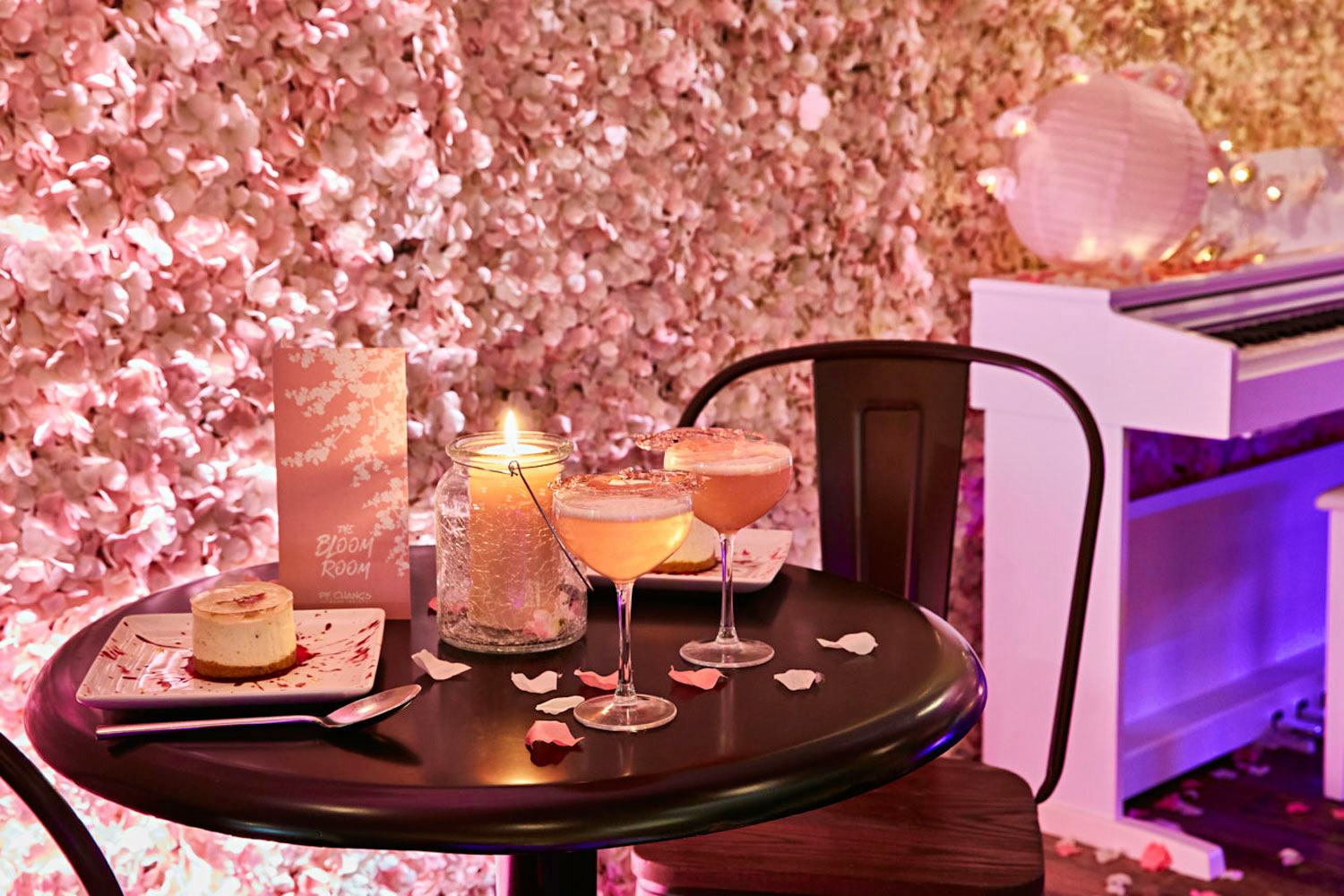 Bloom Room blossom wall drinks on table