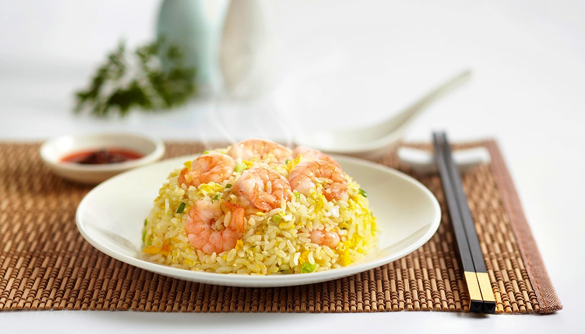 Din Tai Fung prawn fried rice dish with white background