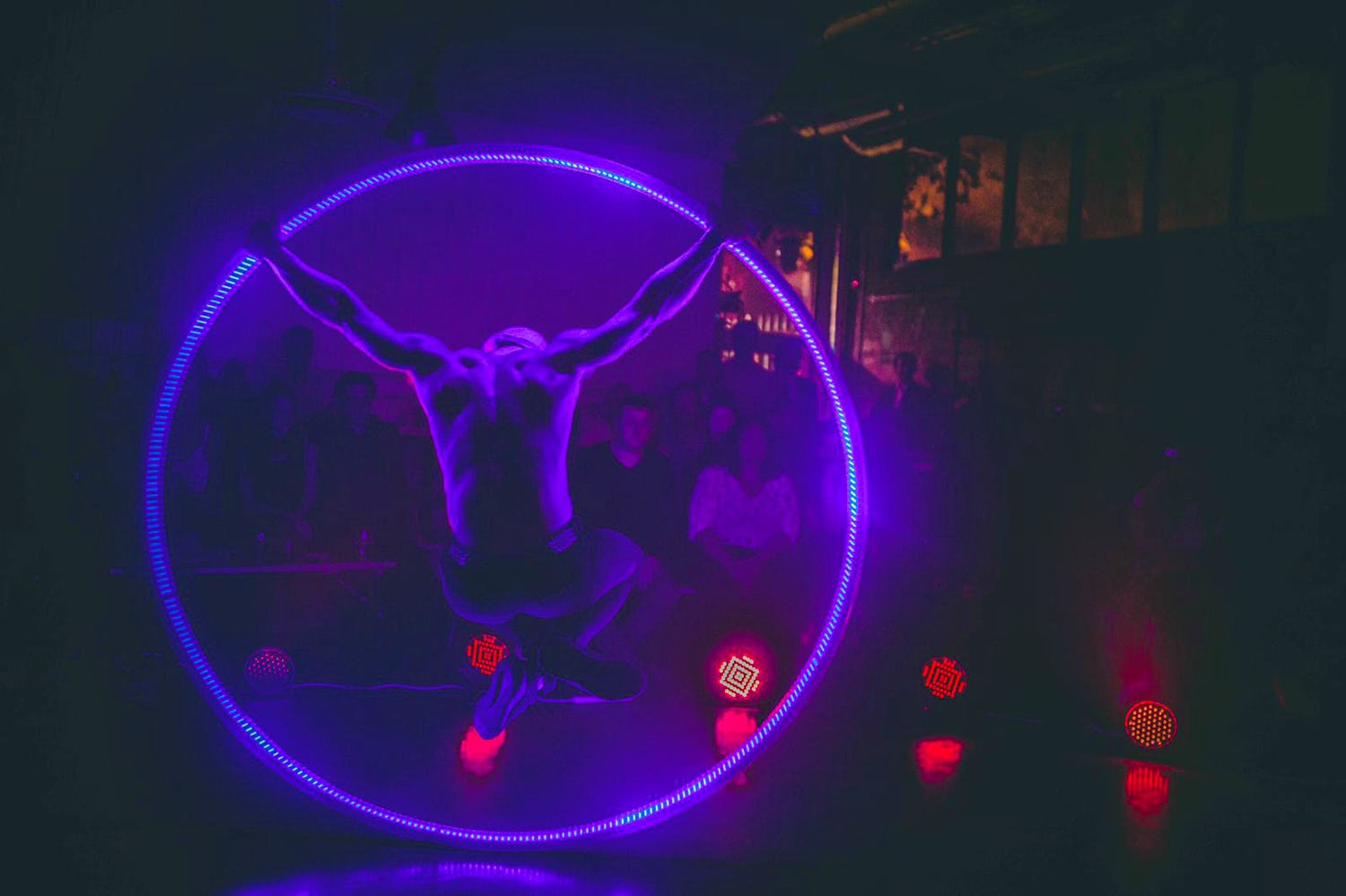 ariel performer in neon hoop