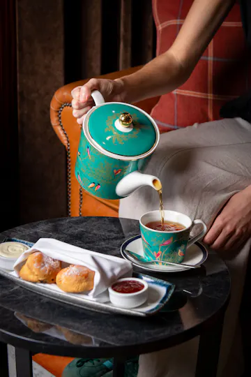 Tea and Tales at The Den, St Martins Lane