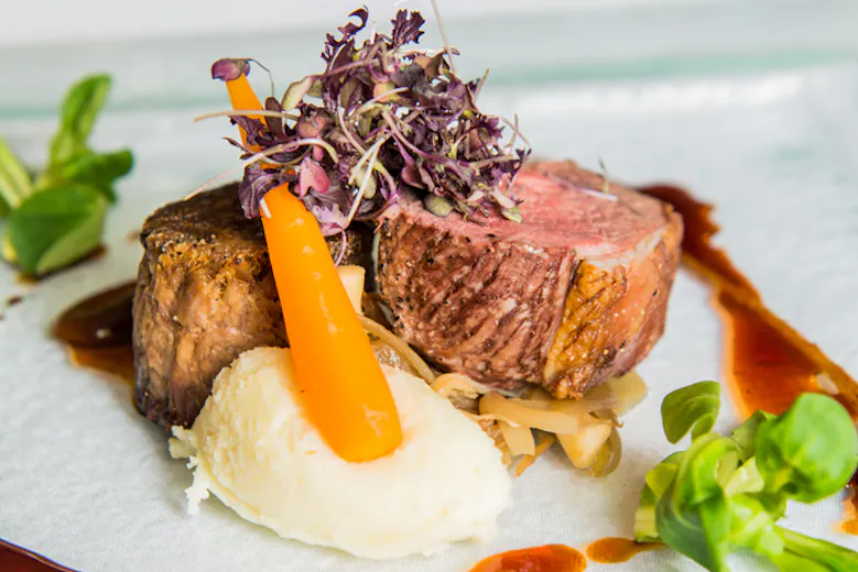 Dine at Coed-Y-Mwstwr Hotel
